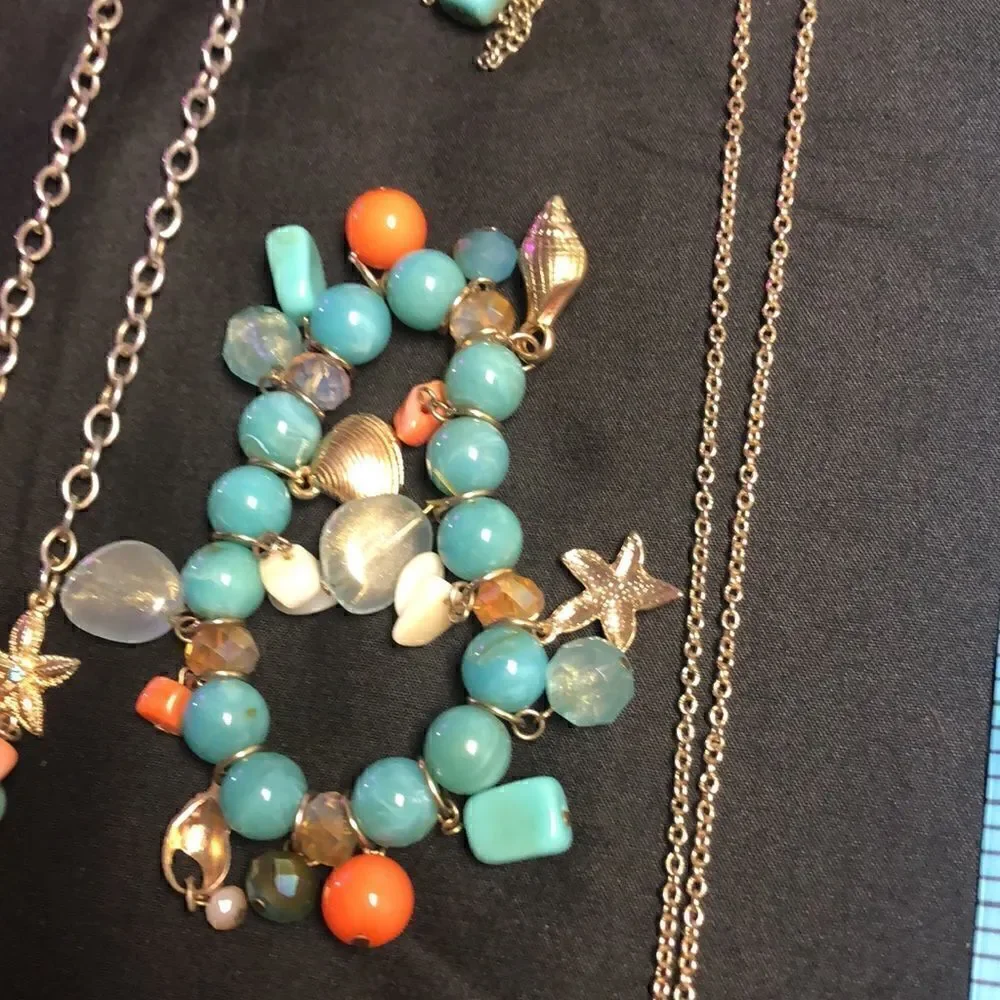 Gold tone jewelry collection w/2 necklace extenders